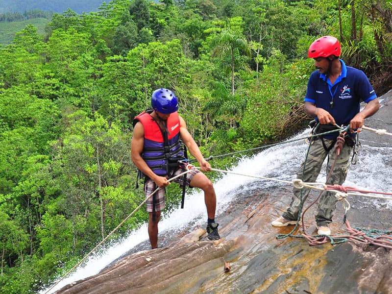 Waterfall abseiling in Kithulgala